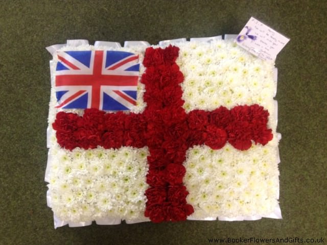 <h2>Bespoke English and United Kingdom Flag | Funeral Flowers</h2>
<ul>
<li>Approximate Size 40cm x 30cm</li>
<li>Hand created white England Flag</li>
<li>To give you the best we may occasionally need to make substitutes</li>
<li>Funeral Flowers will be delivered at least 2 hours before the funeral</li>
<li>For delivery area coverage see below</li>
</ul>
<br>
<h2>Liverpool Flower Delivery</h2>
<p>We have a wide selection of Bespoke Funeral Tributes offered for Liverpool Flower Delivery. Bespoke Funeral Tributes can be provided for you in Liverpool, Merseyside and we can organize Funeral flower deliveries for you nationwide. Funeral Flowers can be delivered to the Funeral directors or a house address. They can not be delivered to the crematorium or the church.</p>
<br>
<h2>Flower Delivery Coverage</h2>
<p>Our shop delivers funeral flowers to the following Liverpool postcodes L1 L2 L3 L4 L5 L6 L7 L8 L11 L12 L13 L14 L15 L16 L17 L18 L19 L24 L25 L26 L27 L36 L70 If your order is for an area outside of these we can organise delivery for you through our network of florists. We will ask them to make as close as possible to the image but because of the difference in stock and sundry items it may not be exact.</p>
<br>
<h2>Liverpool Funeral Flowers | Bespoke Tributes</h2>
<p>This bespoke flag has been loving handcrafted by our expert florists and features a mass of white spray chrysanthemums and a red spray chrysanthemum cross to complete this England Flag. A cotton United Kingdom Flag has been placed in the top corner of the England Flag to make this a lovely tribute for someone proud to be British.</p>
<br>
<p>Bespoke Funeral Tributes are a way to create a tribute that is truly unique and specially designed for a loved one.</p>
<br>
<p>These are sometimes selected by family members as the main tribute or more often a group of friends or workplace colleagues as a symbol of things they associate with the deceased.</p>
<br>
<p>The flowers are arranged in floral foam, which means the flowers have a water source so they look their very best for the day.</p>
<br>
<h2>Best Florist in Liverpool</h2>
<p>Trust Award-winning Liverpool Florist, Booker Flowers and Gifts, to deliver funeral flowers fitting for the occasion delivered in Liverpool, Merseyside and beyond. Our funeral flowers are handcrafted by our team of professional fully qualified who not only lovingly hand make our designs but hand-deliver them, ensuring all our customers are delighted with their flowers. Booker Flowers and Gifts your local Liverpool Flower shop.</p>
<br>
<p><em>Debera G - 5 Star Review on yell.com - Funeral Florist Liverpool</em></p>
<br>
<p><em>Fleur and her team made the flowers for my Dad's funeral. I knew I wanted something quite specific but was quite unsure how to execute the idea. Fleur understood immediately what I was hoping to achieve and developed the ideas into amazingly beautiful flowers that were just perfect. I honestly can't recommend her highly enough - she created something outstanding and unique for my Dad. Thanks Fleur.</em></p>